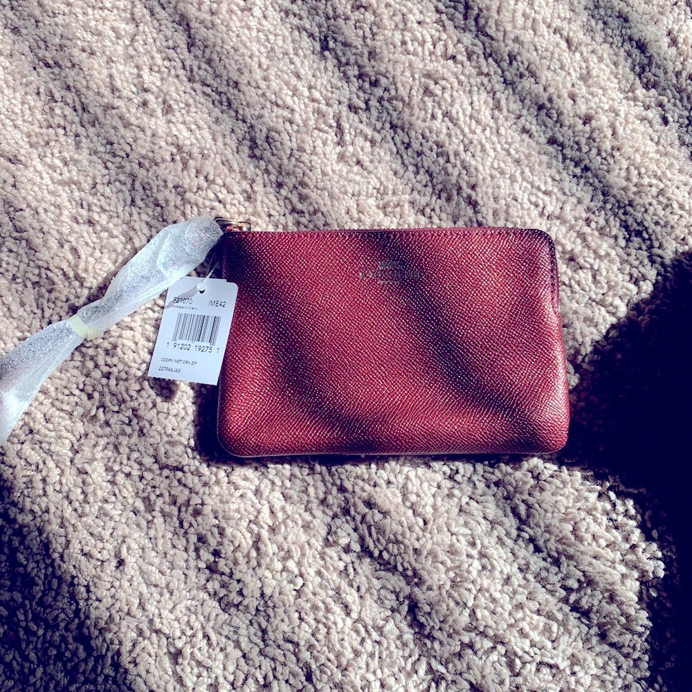 Coach burgundy wristlet